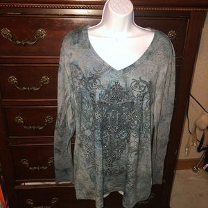 2 Green source long sleeve shirts.